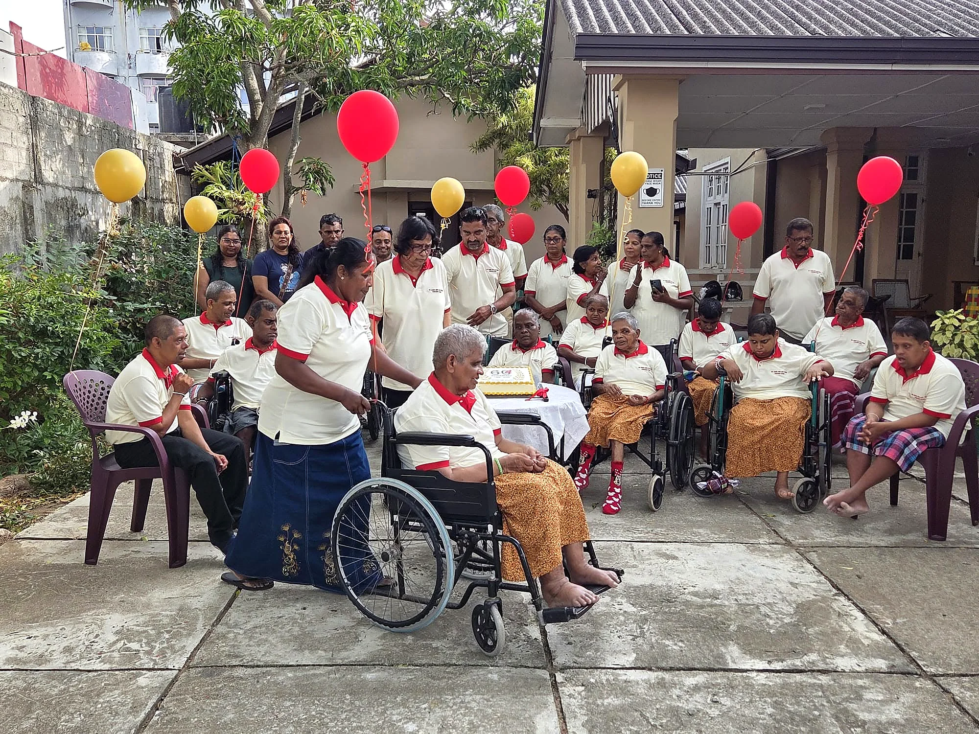 Residents and supporters at the 60th anniversary celebration